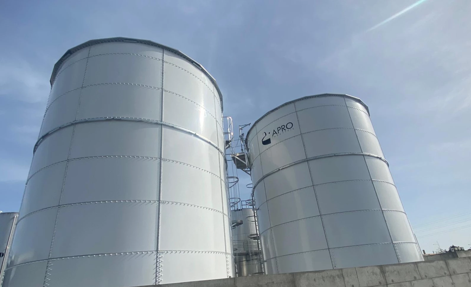 Two Painted Glass-Fused-to-Steel Tanks